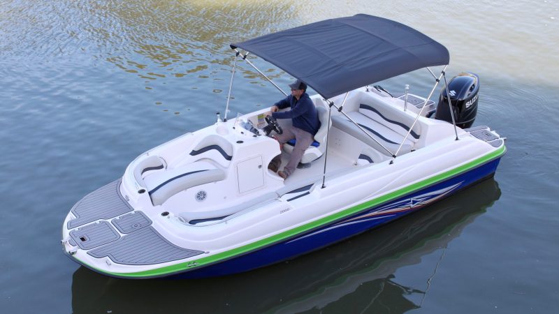 a small boat in a body of water