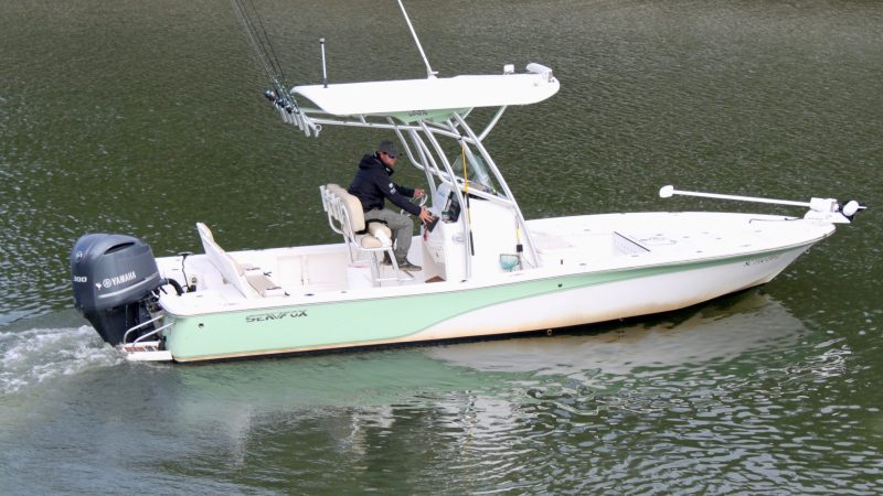 a small boat in a body of water
