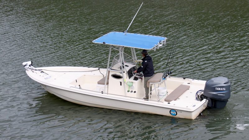 a small boat in a body of water